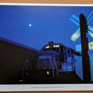 Promotional photo: An SD40-2 moves at night near Columbus, Ohio.