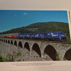 Promotional photo: Led by a B36-7, double-stack containers cross the Starucca Viaduct near Lanesboro, Pa. The Viaduct, built in 1848, is a National Historic Engineering Landmark.