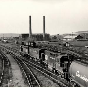Photograph showing GP40 3034, C425 2450 and an unknown GP35 in Sayre PA.