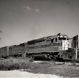 Photograph showing SD45 3612 and U23B 508 eastbound at Elkhart Indiana. 8/29/76.