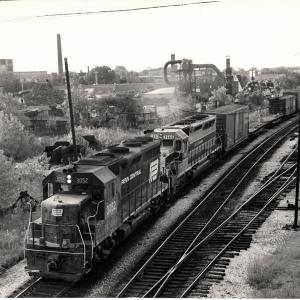 Photograph showing GP40 3052 and SDP45 3666 at Blue Island IL. 8/31/76.