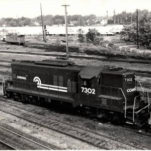 Photograph showing GP9 7302 at Collinwood Yard. 8/28/76