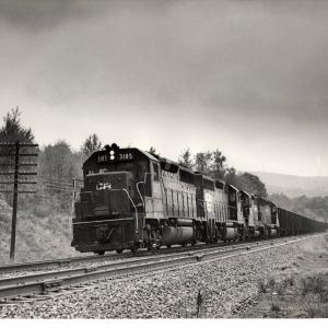 Photograph showing GP40 3185 leading a coal train at Scranton PA. 9/26/76