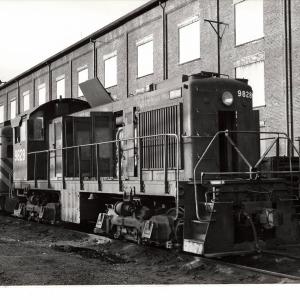 Photograph of S2 9828 out of service at E Port shops. 10/31/76