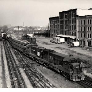 Photograph of U23B 2717 and GP38-2 7967 at Binghamton NY. 4/18/76