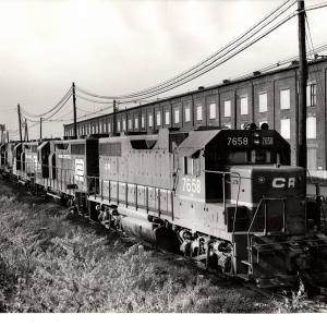 Photograph of ex-LV GP38AC 7658, GP35 2301 and two more EMD units at E Port. 10/31/76