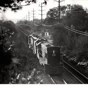 Photograph of U23B 2765, SD45 6213 and another EMD on an eastbound coal train at Reading PA. 10/21/76