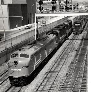 Photograph of E8 4022, SD45 6205 and SD45 6158 on Train #9 in Altoona PA. 5/28/77