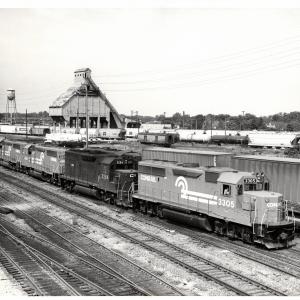 Photograph of GP40-2 3305, GP40 3264, GP40-2 3306 and an unknown GP40-2 in Collinwood Yard, Cleveland OH. 7/23/77