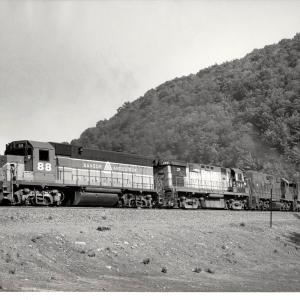 Photograph of C425 2491, GP38 7973, SD45 6155 and BAR GP38 88 on Horseshoe Curve. 5/27/77.