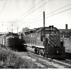 Photograph of GP40P 3683 and E8 4267 at South Amboy NJ. 7/15/77