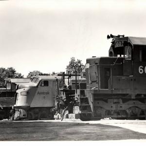 Photograph of SD40 6070 and other units at Harrisburg PA. 7/76