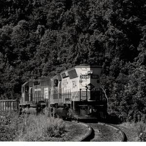 Photograph of SD45 7604 and SD40 6282 at Rockville Bridge. 7/76
