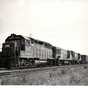 Photograph of GP40 3137, U25B 2626 and an unkniwn U23B at Orrville OH. 7/30/76