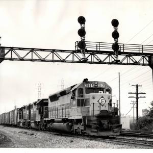 Photograph of SDP45 3668, GP38-2 8005 and another GP38-2 east of Cleveland OH. 7/31/76