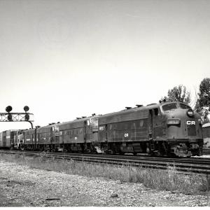 Photograph of F7 1850, F7 1786 and two more Fs eastbound at Alliance OH. 7/22/77