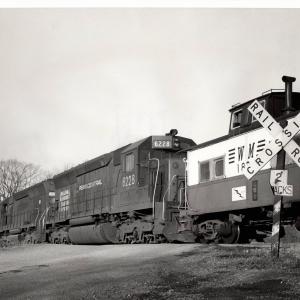 Photograph of SD45 6228 and another SD45 shoving a Western Maryland train at Hagerstown MD. 2/15/77