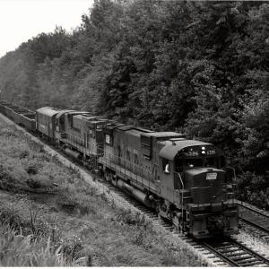 Photograph of C630 6326, another C630 and an F7 at Hudson OH. 7/30/76