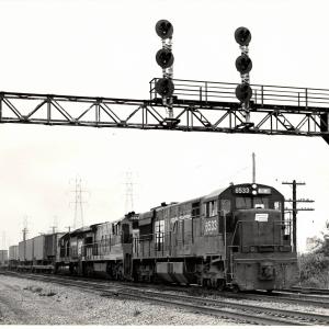 Photograph of U28C 6533 U36C 3323 and an unknown SD40 in Cleveland OH. 7/76