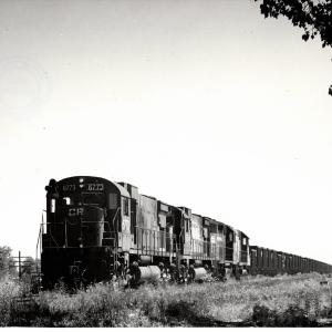 Photograph of C630 6773, C630 6754 and two more units on an empty ore train at Alliance OH. 7/22/77