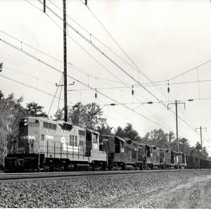 Photograph of GP9 7189, GP9 7238 and three more units on a Southbound Morgantown Turnaround coal train at Baltimore MD. 7/3/77