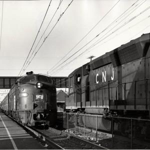 Photograph of GP40P 3674 and an unknown E8 at South Amboy NJ. 12/5/76