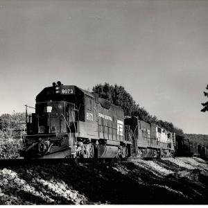 Photograph of GP38-2 8073, U23B 2754 and an unknown GP30 at Endicott NY. 9/27/76