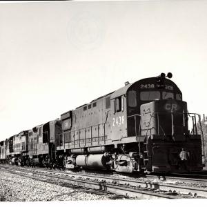 Photograph of C424 2438, GP9 7033 and more units entering Conway Yard. 5/16/77