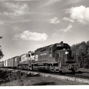Photograph of SD40 6082 and U30C 6304 at Lilly PA. 6/28/76