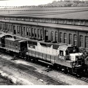 Photograph of GP35 6362 and SW1001 2608 at Rutherford Yard. 7/76