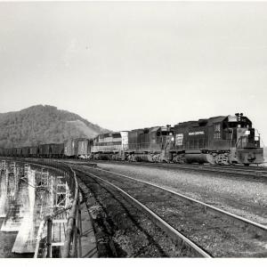 Photograph of GP40 3122, GP40 3056 and SD45 3612 on Rockville Bridge. 5/76