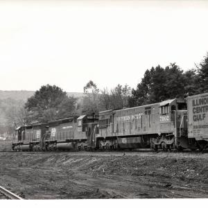 Photograph of an unknown SD40, SD45 6222, and SP U30C 7902 eastbound at Marysville PA. 11/2/76