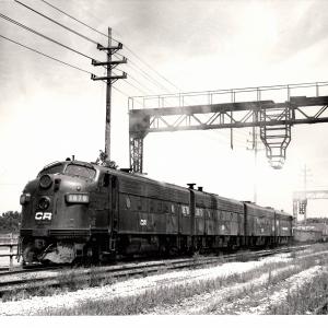 Photograph of F7 1878, F7B 3873 and two more F units on a freight out of Collinwood Yard in Cleveland OH. 7/25/76