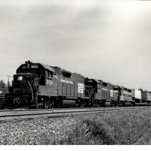 Photograph of GP38-2 8104, GP38-2 7992 and SDP45 3665 westbound at Cresson PA. 6/76