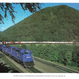 Promotional photo: An SD45-2 pulls an intermodal train around historic Horseshoe Curve near Altoona, Pa.