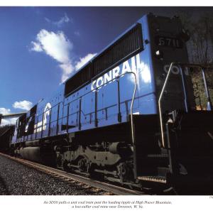 Promotional photo: An SD50 pulls a unit coal train past the loading tipple at High Power Mountain, a low-sulfur coal mine near Drennen, W. Va.