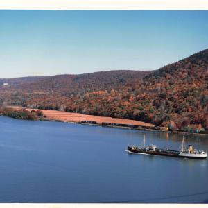 Conrail train along river, location unknown