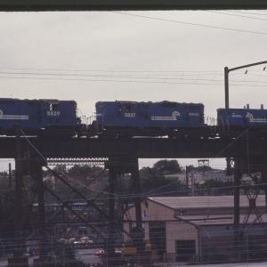 GP7s 5829 and 5837 with SW1500 9594 in Philadelphia, PA