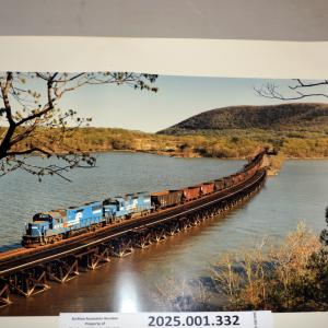 Photo Freight train traversing trestle at River Line, Iona Island, 1985-04-27