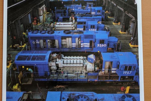 Promotional photo: Conrail locomotives receive repairs at the Juniata Locomotive Shop, Altoona PA., one of the world's largest railroad shops.