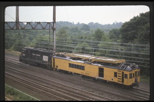 Conrail 65415 in Monmouth Junction NJ on 7/21/76