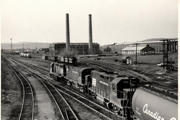Photograph showing GP40 3034, C425 2450 and an unknown GP35 in Sayre PA.