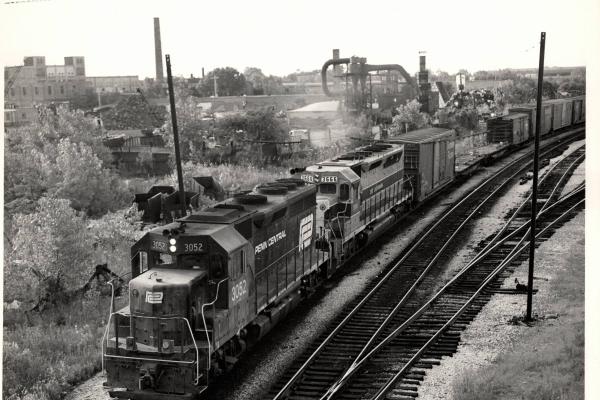 Photograph showing GP40 3052 and SDP45 3666 at Blue Island IL. 8/31/76.
