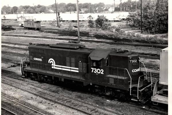 Photograph showing GP9 7302 at Collinwood Yard. 8/28/76