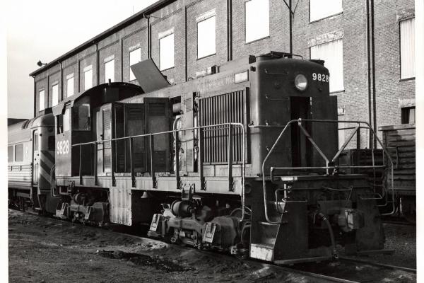 Photograph of S2 9828 out of service at E Port shops. 10/31/76
