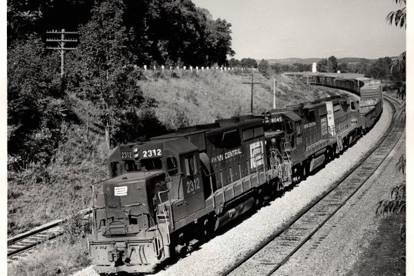 Photograph of GP35 2312, GP38-2 8045 and an ex-EL GP35 westbound at Smithboro NY. 9/26/76