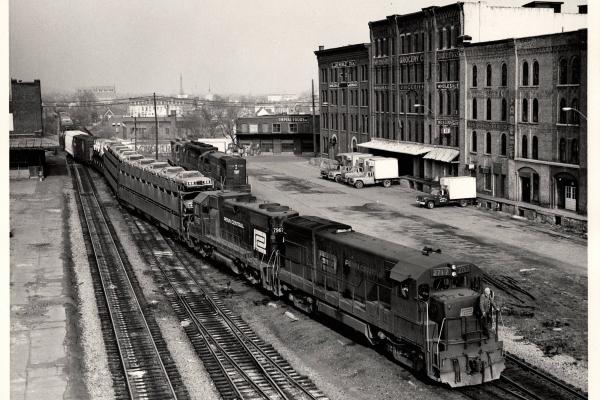 Photograph of U23B 2717 and GP38-2 7967 at Binghamton NY. 4/18/76