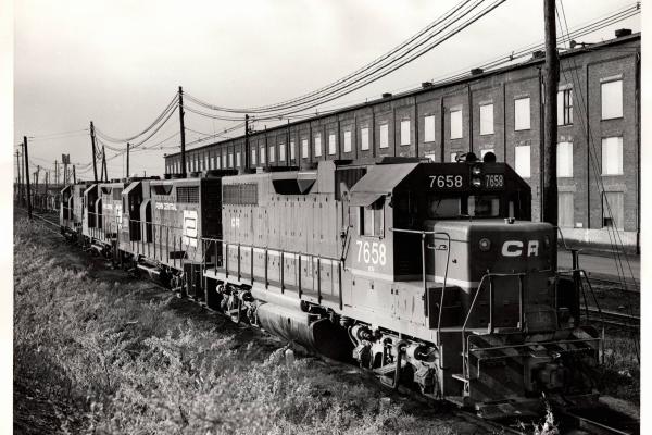 Photograph of ex-LV GP38AC 7658, GP35 2301 and two more EMD units at E Port. 10/31/76