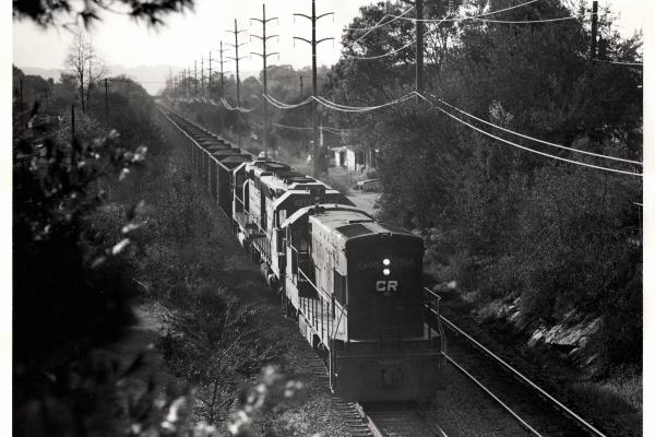 Photograph of U23B 2765, SD45 6213 and another EMD on an eastbound coal train at Reading PA. 10/21/76