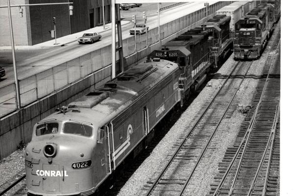 Photograph of E8 4022, SD45 6205 and SD45 6158 on Train #9 in Altoona PA. 5/28/77